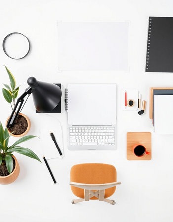 Flat lay, top view office desk. Work space with laptop, coffee cup, stationery and plant.
