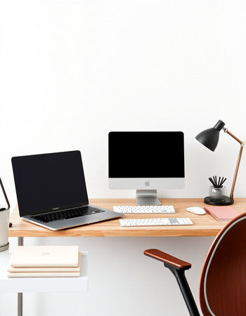 Modern workplace with blank screen computer monitor, keyboard, mouse, coffee cup and stationery on...