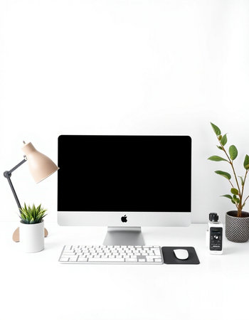 Modern workspace with computer, keyboard, mouse, lamp and plant on white background