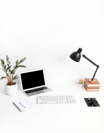 Modern workspace with laptop, stationery and plants on white background. Flat lay, top viewの写真素材