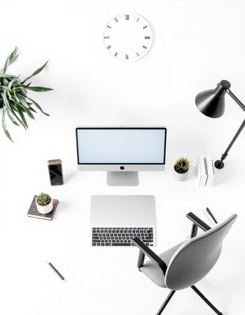 White office desk with computer, laptop and other items. Top view, flat lay