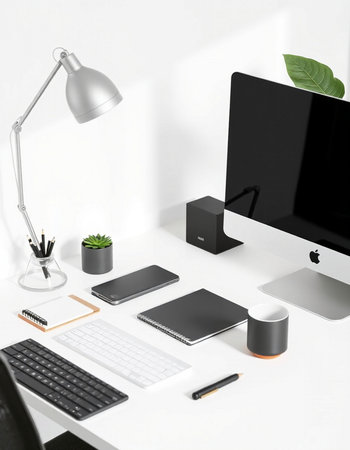 Modern workplace with computer, supplies and coffee cup on white background. 3D Rendering