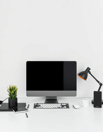 Modern desktop with computer, keyboard, mouse and lamp on white background