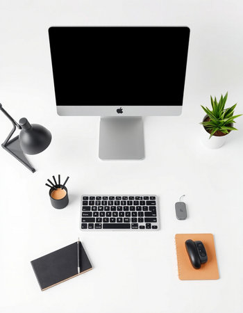 Top view of modern workplace with computer, stationery and decorations on white background