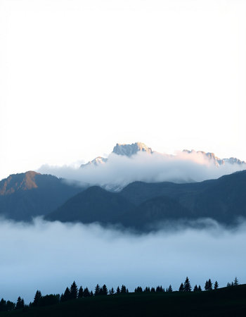 Mountain landscape with fog and clouds.の写真素材