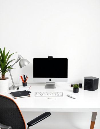 workplace with computer, keyboard, mouse and plant on white backgroundの写真素材