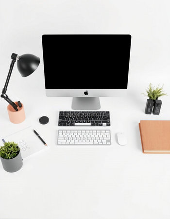 Modern workspace with computer, keyboard, mouse, notebook and coffee cup on white background. Flat lay, top viewの写真素材
