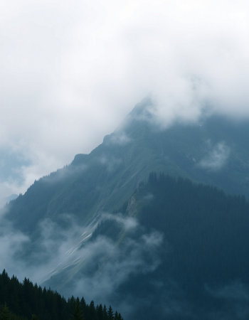 Mountains in the clouds in the summer, Caucasus, Russia.の写真素材