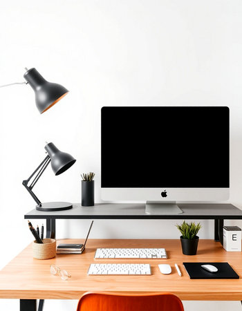 workplace with computer, lamp, mouse, keyboardの写真素材