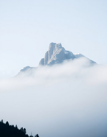 Mountain peak in the clouds, Dolomites, Italy.の写真素材