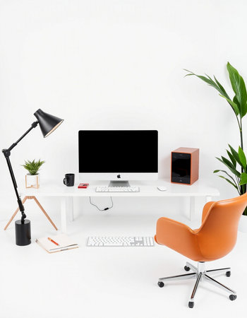 Modern workspace with computer, lamp and plant on white background. 3d renderの写真素材