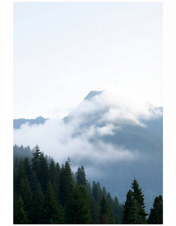 Mountains in the fog. Clouds in the sky. Beautiful mountain landscape.の写真素材