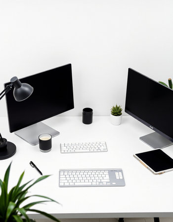 Office desk with computer, coffee cup, smartphone and plant. Mock upの写真素材