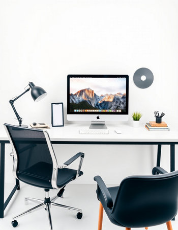 workplace with computer, lamp and chair in modern officeの写真素材