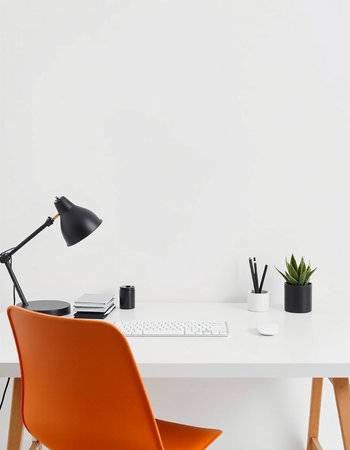 Modern workspace with orange chair, computer and stationery. Mock upの写真素材