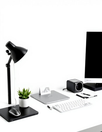 Modern workplace with computer, lamp and other objects on white background. 3D rendering.の写真素材