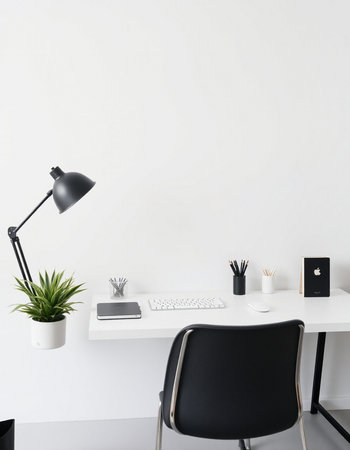Modern office interior with white wall, computer, plant and lamp. 3d renderの写真素材