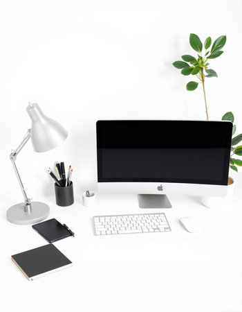 Modern workspace with computer, stationery and plant on white background. Flat lay, top viewの写真素材
