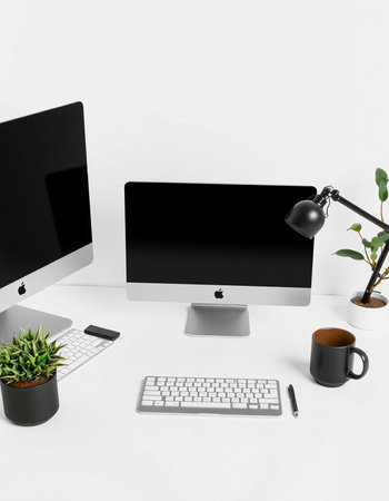 Modern workplace with computer, keyboard, mouse, coffee cup and plant on white backgroundの写真素材