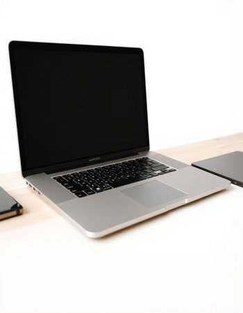 Laptop and smartphone on the desk isolated on the white background.
