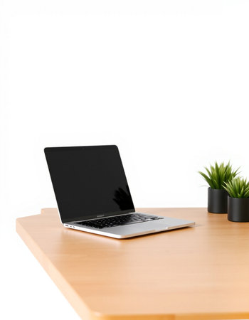 Laptop on wooden desk isolated on white background with clipping path.