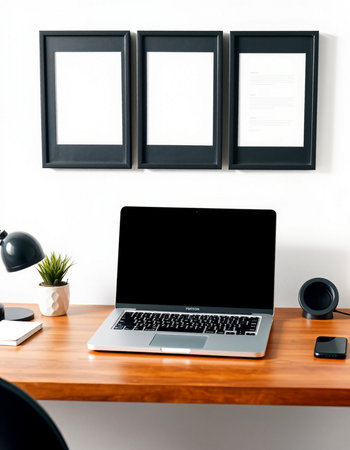 Laptop with blank screen on wood desk at home office, stock photo