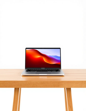 Laptop on wooden table isolated on white background with clipping path.
