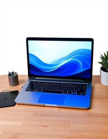 Laptop on wood table with keyboard, mouse and plant on white background