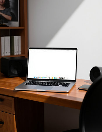 Laptop with blank screen on table in office. Mock up template