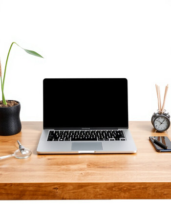 Laptop computer with blank screen on wooden table isolated on white background
