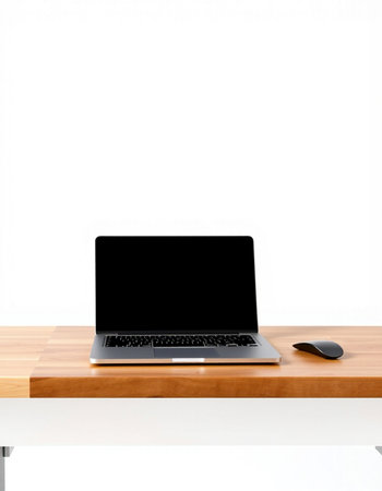 Laptop with blank screen on a wooden desk isolated on white background