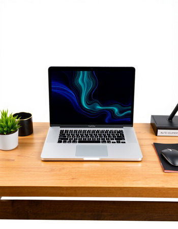 Modern workplace with blank screen laptop computer on wood table and white wall background