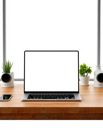 Modern workspace with blank screen laptop computer on wood table and white wall backgroundの写真素材