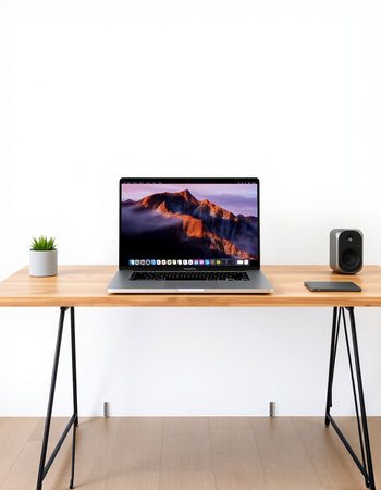 Modern workspace with computer on the desk. 3d render illustration.の写真素材
