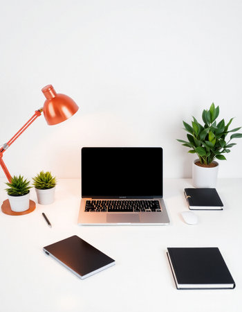 Modern workspace with blank screen laptop computer, smartphone, tablet, coffee cup and other items....