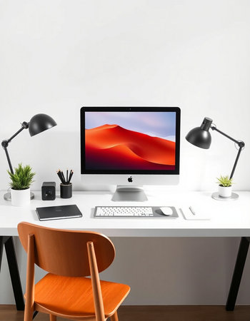 workplace with computer, lamp and chair.