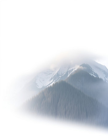 Mountains in the clouds on a foggy day. Winter landscape.の写真素材