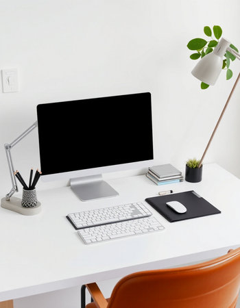 workplace with computer and stationery on white table in modern office