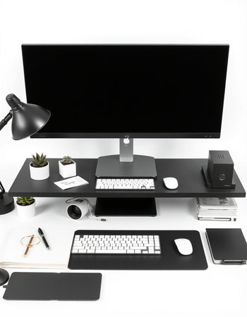 Modern black and white office desk. Workplace with computer, keyboard, mouse, notebook, cup of...