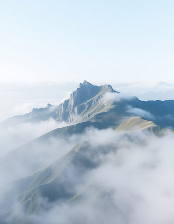 Mountain landscape with clouds and fog.