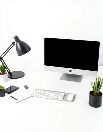 workplace with computer, lamp, stationery and plant on white background