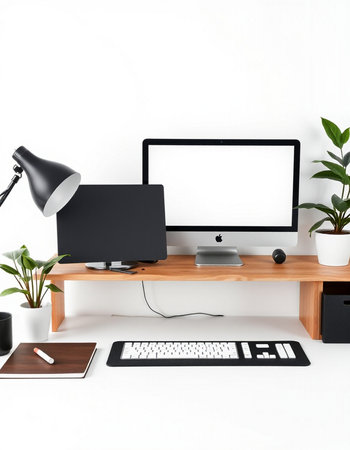Modern workplace with blank screen computer, keyboard, mouse and other items on white background.