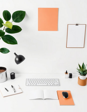 Minimal workspace with computer, stationery and plant on white background. Flat lay, top view