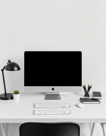 Front view of modern workplace with blank black computer monitor, keyboard, stationery and...