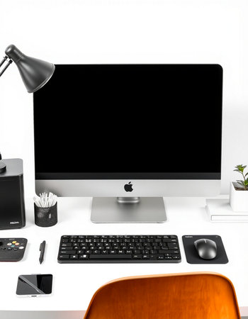 Modern workspace with computer, keyboard, mouse, lamp and coffee cup on white background