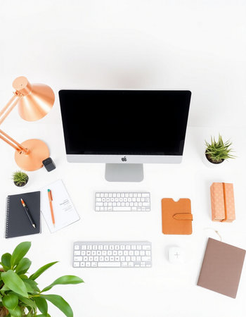 Office desk table with computer, supplies and coffee cup. Flat lay, top viewの写真素材