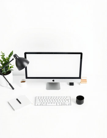 Workplace with computer, coffee cup and stationery on white background
