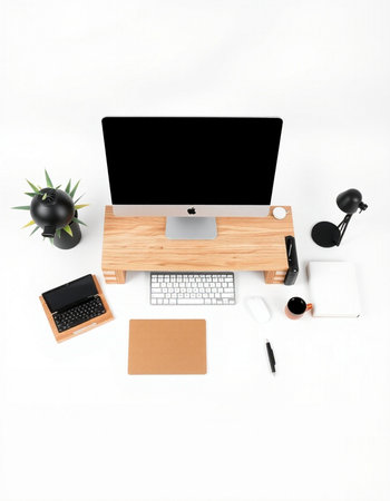 Modern office desk with computer, supplies and coffee cup on white backgroundの写真素材