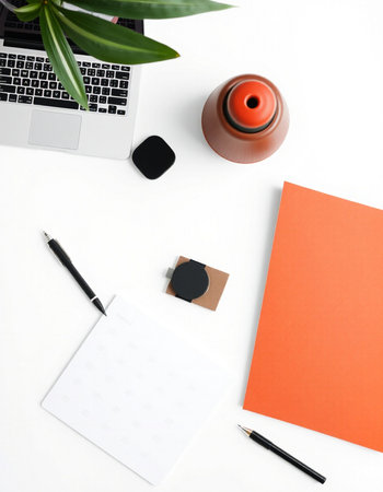 Flat lay, top view office desk table. Workspace with laptop, smartphone, notebook, stationery and coffee cup.の写真素材