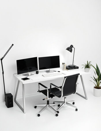 Workplace with computer, lamp and plant on white background. 3d renderingの写真素材